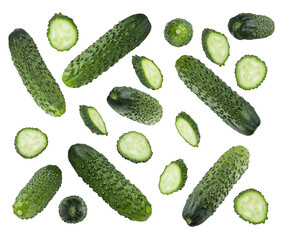 Mix of bright fresh green cucumber whole and slices as pattern, isolated on white background. Studio shot. Perfect for nutrition and gardening product branding, healthy eating as design element.