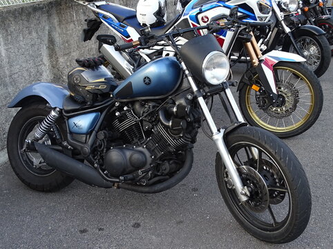 Yamaha XV250 Virago motorcycle parked near a wall