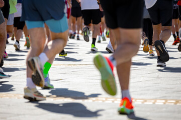 Large group of athletes running marathon
