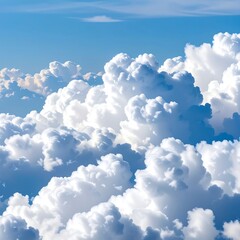 Fluffy clouds against a vibrant blue sky