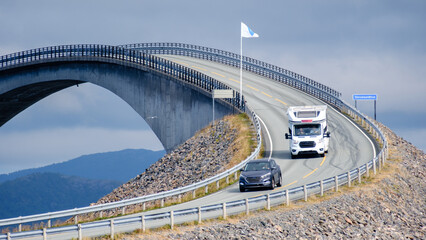 A captivating view of vehicles navigating the Atlantic Ocean Road in Norway.