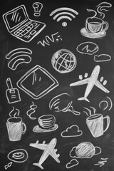 Creative and Imaginative Doodles Depicting Travel and Technology on a Chalkboard Surface