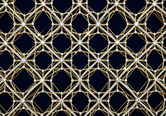 Fototapeta premium Intricate golden lattice pattern adorns deep blue surface, creating a luxurious and sophisticated texture with geometric precision and elegant aesthetic.