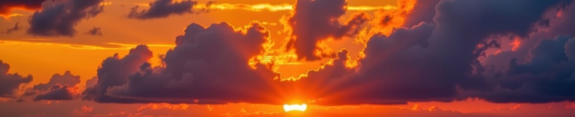 Dramatic sunrise behind a thick cloud layer, vibrant orange and yellow light breaking through, creating a breathtaking celestial spectacle, morning, dawn