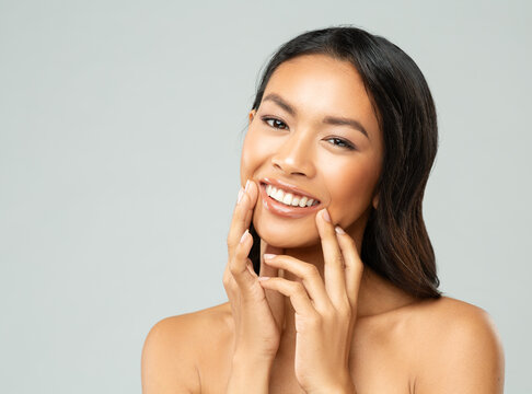 Happy Asian Woman with Perfect White Teeth Smile. Women Lips Treatment. Mouth Care. Beautiful Korean Girl Plastic Surgery. Face Dermal Filler and Lip augmentation. Permanent Makeup