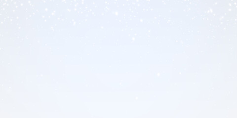 Gentle snowflakes are falling softly, creating a beautifully serene winter atmosphere against a vivid blue background
