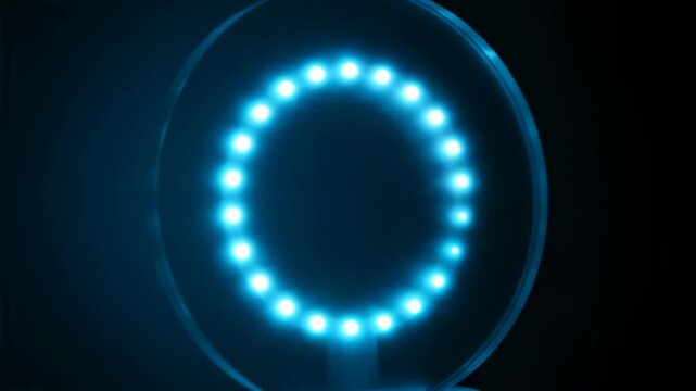 Spinning LED Halo Behind Frosted Plexi in Cyan Light