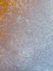 Rusty textured metal surface with oxidation and patina detail