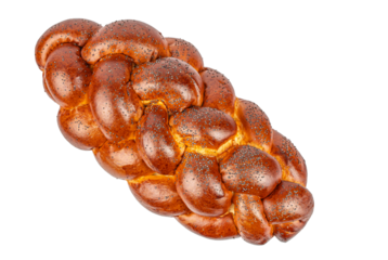 Traditional braided challah bread with poppy seeds isolated on white background