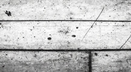 Gray-toned, weathered wooden planks with marks and blemishes