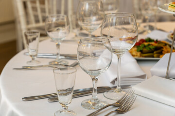 Elegant festive table setting in a restaurant for a holiday dinner party