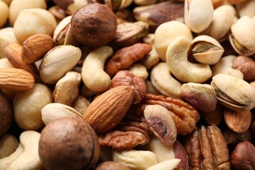Mix of different nuts as background, closeup