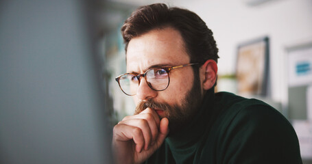 Glasses, computer and reading with business man in office for seo research, blog traffic and...