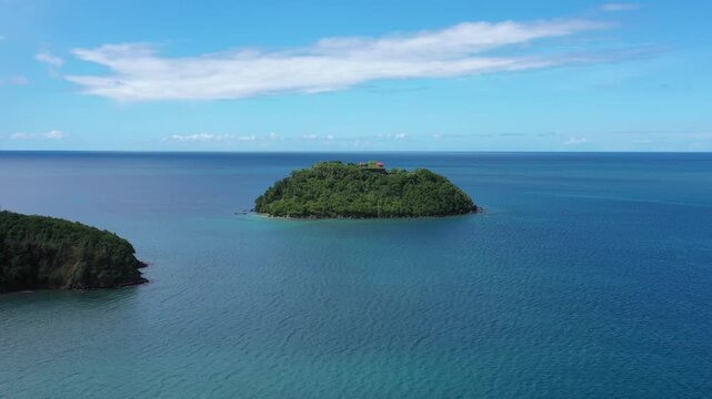 Aerial view of islet Ramier in Martinique surrounded by turquoise Caribbean waters under blue sky