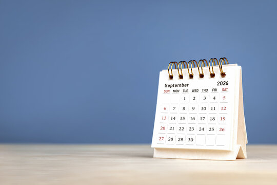 Calendar page September of the year 2026 on blue background. with copy space and business design. Concept of monthly planning, important schedules, meetings, and appointments.