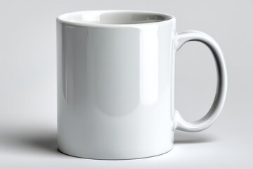 White ceramic mug isolated on a plain background for design mockup