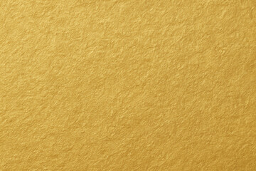 Golden Paper Texture: A close-up shot of a luxurious golden paper texture reveals intricate patterns and a warm, inviting aesthetic. Perfect for design backgrounds and branding.
