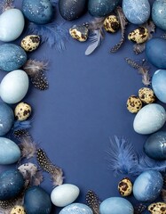 Blue Easter eggs and feathers arranged in a frame