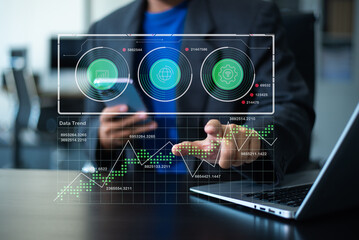 A professional uses technology for business, from data analysis to AI and network security. Perfect for themes of innovation, modern work, and success.