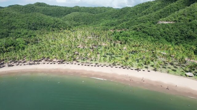 An epic cinematic aerial view captures the dramatic scale and pristine beauty of Venezuela's remote Peninsula de Paria.