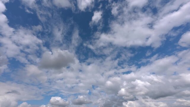 Timelapse of a large atmospheric front rolling over Poland, clouds moving in waves across the horizon.