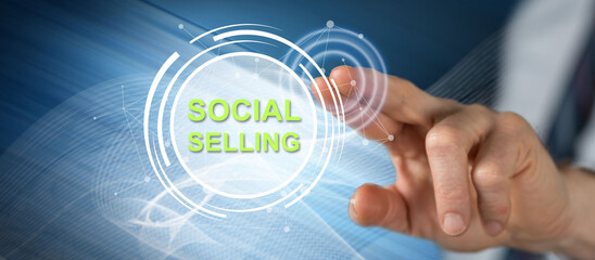Obraz na płótnie Canvas Man touching a social selling concept