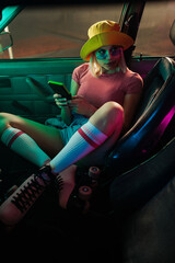 Vintage retro woman in car.