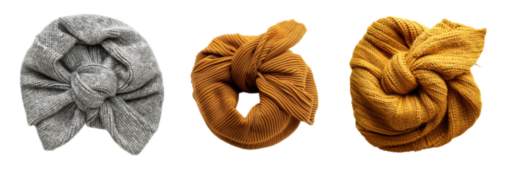 Display of elegant hand knitted head wraps in neutral colors, studio lighting