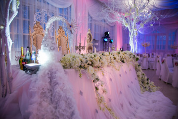 Stunning peacock themed wedding table decoration for bride and groom