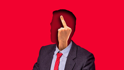 Surreal collage. Faceless businessman with hand pointing middle finger upward inside head...