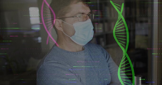 Mature researcher wearing mask and glasses gazing floating DNA helices in study with data lines
