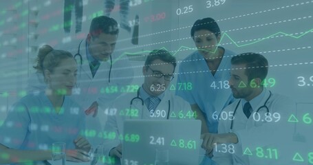 Analyzing data overlays on laptop in clinic, team in medical attire with stethoscopes, water glass