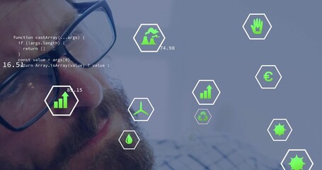 Bearded man in plaid shirt analyzing hexagonal icons and code snippets in workspace, copy space
