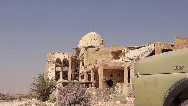 A powerful shot of war-torn Aleppo, Syria, with destroyed buildings, massive urban ruins, and a damaged mosque dome. Ideal for historical documentation, documentaries, news, and education.