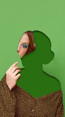 Digital artwork. Surreal faceless woman with partial portrait and hand gesture on green background. Concept of psychology, self-perception, social campaigns, and modern art visuals.