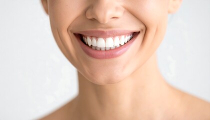 Obraz premium Closeup of a womans perfect white smile with showing healthy teeth and good dental hygiene.