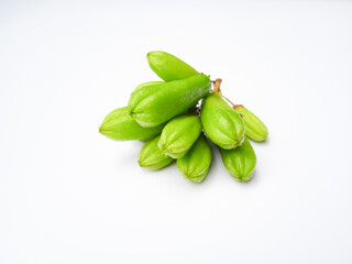 Fresh green bilimbi fruits clustered on stems, also known as cucumber tree fruit or kamias in some regions, is a powerhouse of nutrients and traditional remedies.