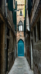 Blue Door in a Narrow Venetian Alley
