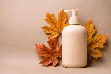 Cream bottle with autumn leaves