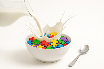 Colorful Puzzle Piece Cereal with Milk Splash in White Bowl