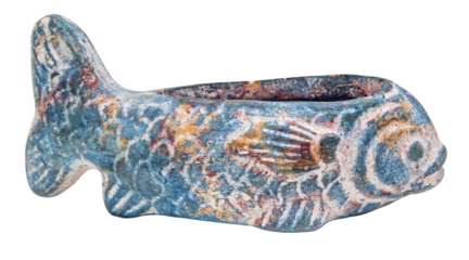 Ancient egyptian faience fish-shaped vessel showing colorful glaze and intricate details on transparent background