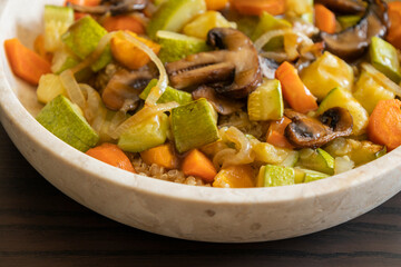 A cozy fall-inspired quinoa bowl filled with roasted vegetables, served warm and fresh
