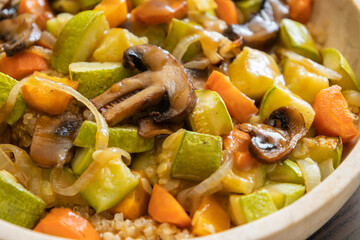 A cozy fall-inspired quinoa bowl filled with roasted vegetables, served warm and fresh