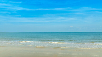 Nature of the ocean and blue sky Summer with sunshine, sandy beaches, clear blue waters sparkling against the blue sky. on an island with good ecology and environment Background for summer vacation