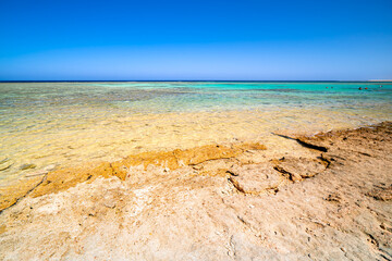 Obraz premium Beach in Egypt, Marsa Alam, crystal-clear Red Sea. Tropical vacation in Africa.