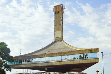 Brutalist architecture in Belgrade: iconic 25 Maj building with curved concrete forms. Landmark of...