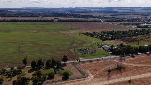 Transformer station for switching electrical energy over long distances and into the city. Svitavy, Czech Republic. Drone shot