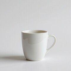 Obraz premium Simple Elegant White Coffee Mug Isolated on Soft Background