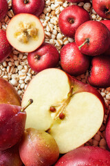 Juicy Red Apples and Pears with Job's Tears on Rustic Background, Red apples and bulgur, healthy...