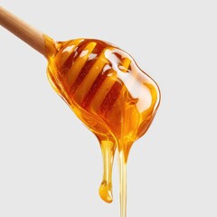 Honey dripping from a wooden dipper (3)
